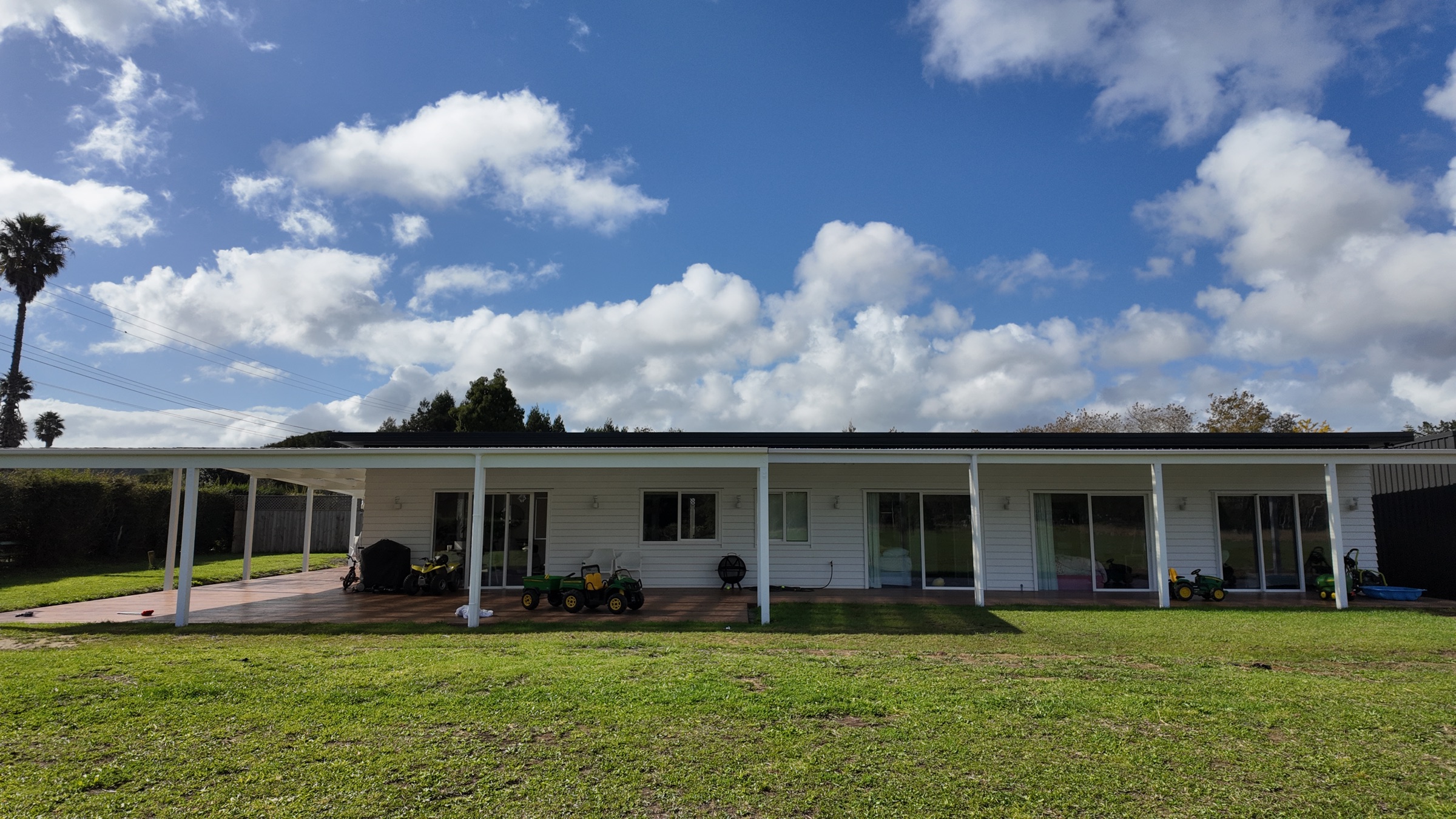Completed rear elevation with the veranda running along the house