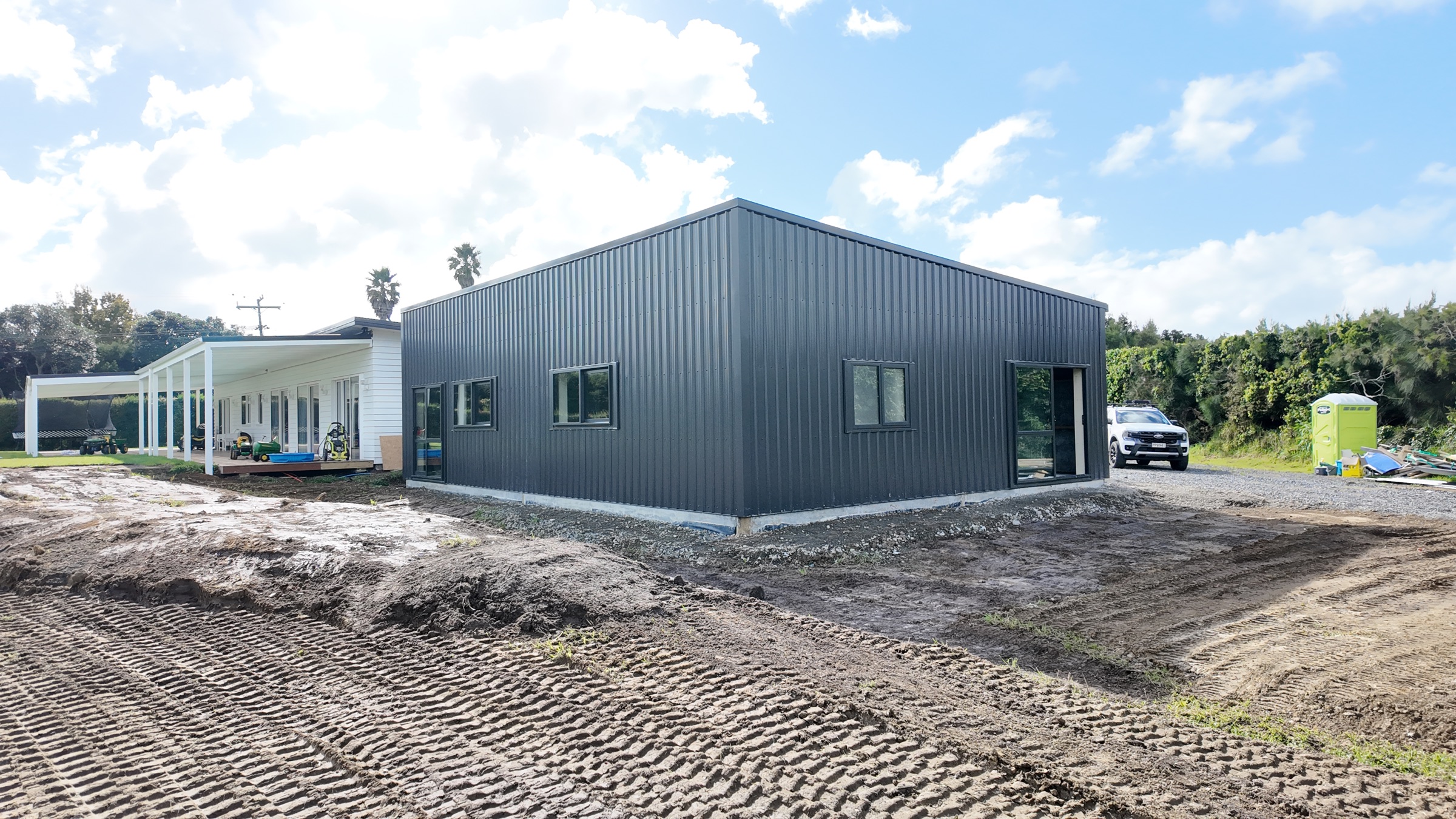 New home with later garage and veranda in Bristol Road, Whenuapai
