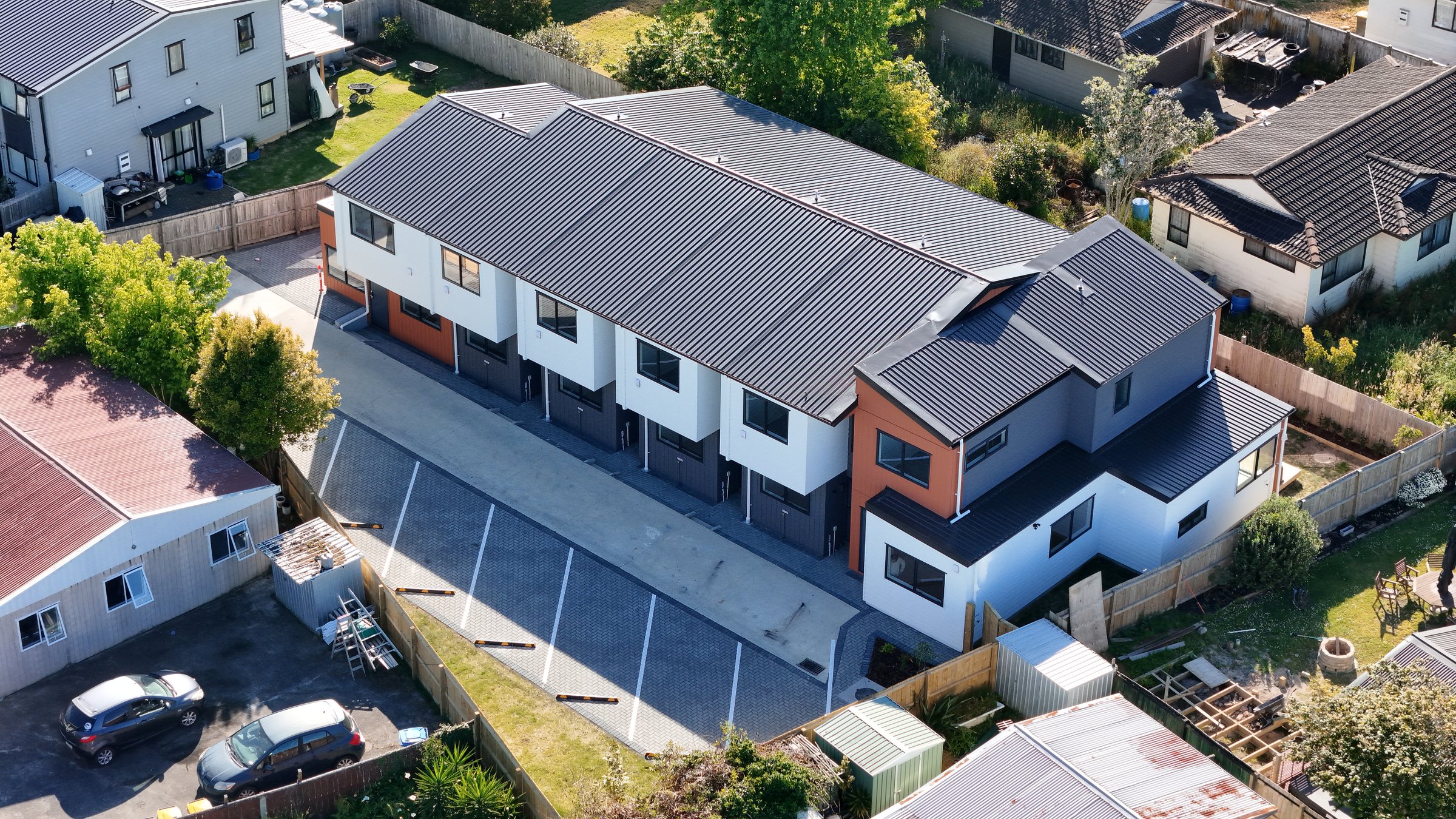 Three-quarter aerial view of the Ranui townhouse development