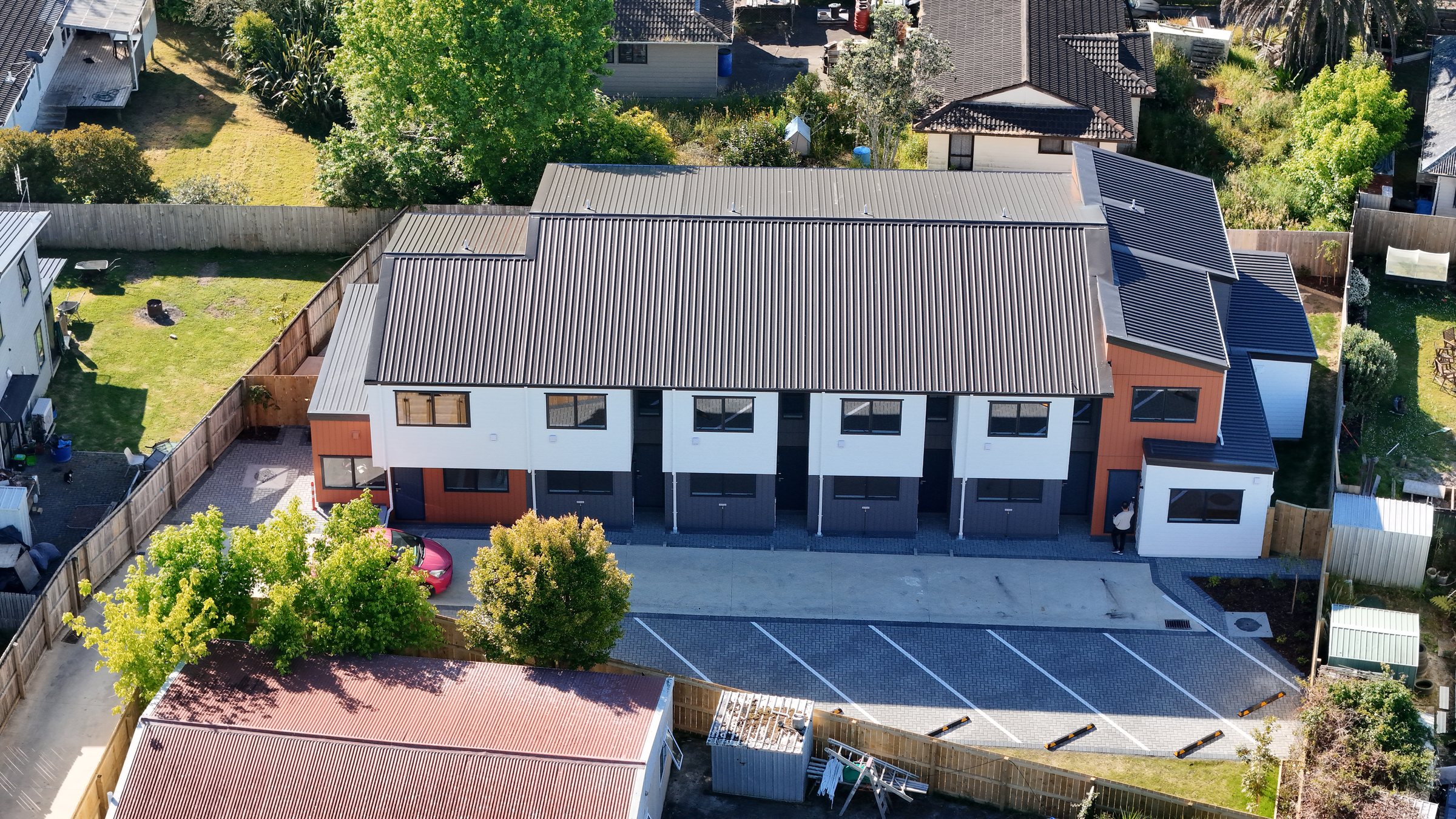 Aerial overview of the completed townhouse development in Ranui